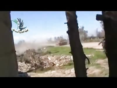 FSA Fighter throws a Grenade down a Tank Barrel 