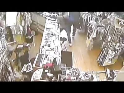Shop Owner with a Bat Fights off Huge Man with a Gun Trying to Rob and Kill Him