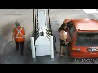 Girl Pumping Gas gets Tossed by the Gas Hose