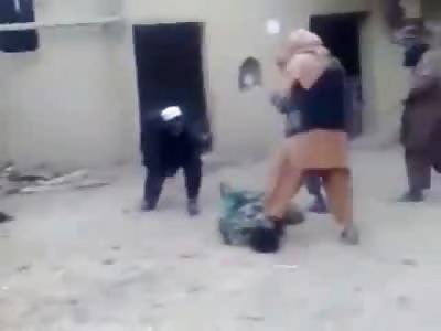 Man in Uniform gets a Brutal Ass Whipping from Taliban....Literally