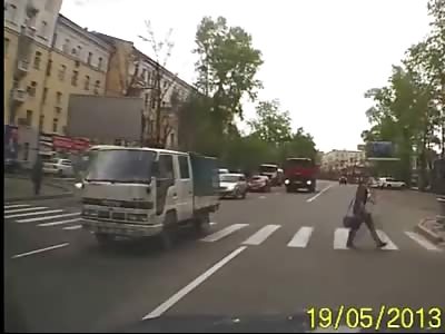 Oblivious Man and Oblivious Truck Driver Result in Guy Crushed to Death