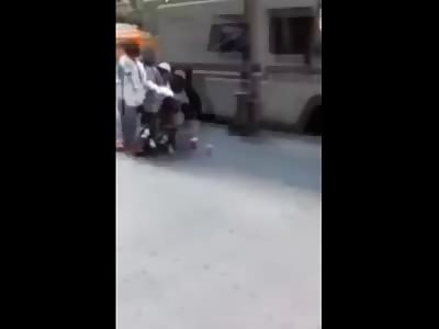 Disgusting Black Woman Tries Robbing Woman in Wheelchair...Gets Dropkicked by Dude