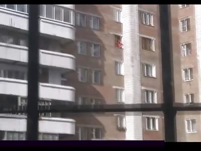 Deranged Bloody Man Stabs Himself Then Jumps off of Building