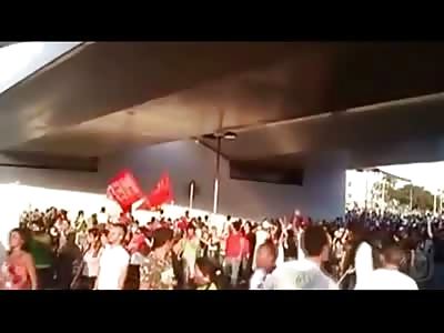Kid Protester in Brazil falls to his Death from Overpass and No One Notices......