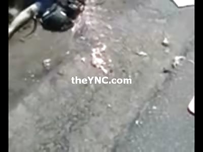 Wind Blows Box off Biker to Reveal his Crushed Head