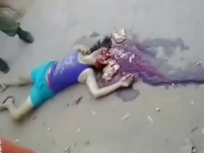 Brazilian Woman in Purple Tank Top Head Crushed is Peeled off the Road (Watch Full Video)