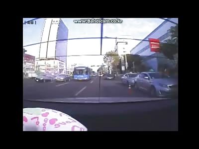 Super Scooter Girl Flies Up and Over Car