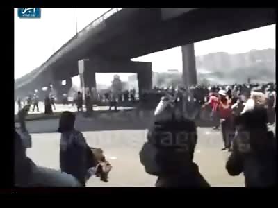 Police Car Falls From Bridge During Egyptian Protests is Bum Rushed by Mob