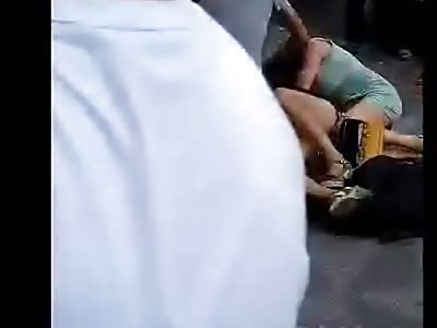 Guy Beating Two Women on a Sidewalk like Trash Whores (Their Pimp?)