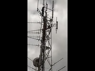 Man Leaps to his Death from Communications Tower in front of Neighborhood (New)