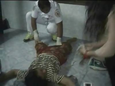 Sad Woman lies on her Back with Death under her Dress (Video is Graphic..18 + Only)