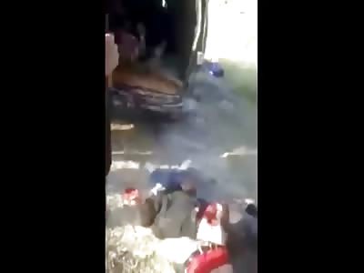 FSA Machine Gun Execute Men as they Exit the Truck