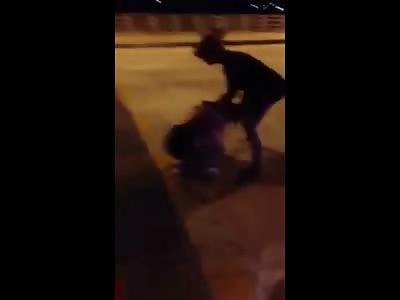 Girl is Ripped off the Back of a Motorcycle and Beaten in the Street like a Dog