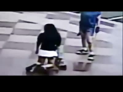 Daughter tortured by mom in street after caught skipping classes 