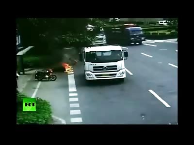 Motorcycle Collides with Truck, Gets Dragged, then Combust's into Flames