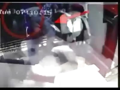 Little Woman in Red is Manhandled by Big Black Man in ATM in India with a Machete
