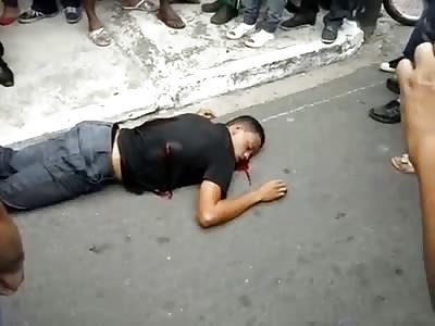 Boy takes Final Long Gasps of Air while Dying on the Street from Gunshots
