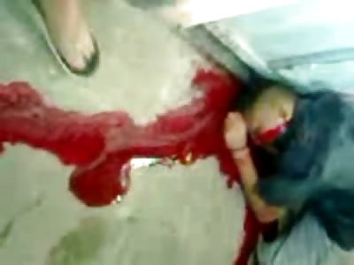 Thief Shot in  the Head Bleeds out a River of Coagulated Warming Blood 