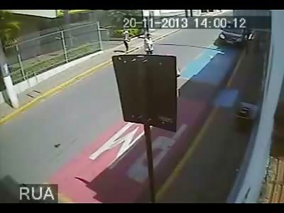 Woman Crossing the Street is Struck by Motorcyclist 