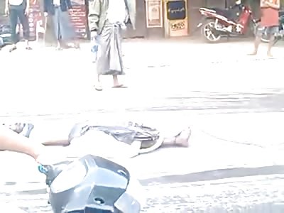 Dragging the Dead Body of their Enemy Muslim through the Street on Motorcycle