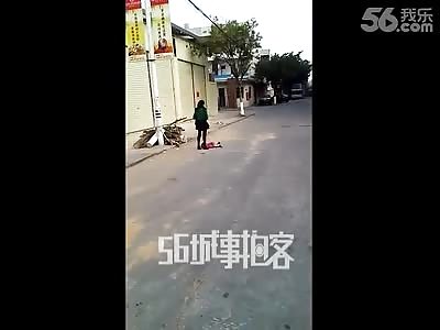 Insane Mother Argues with Police after Being Caught Beating her Baby in the Street
