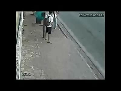 Man Waiting at a Bus Stop is Shot Several Times by a Really Pissed off Dude