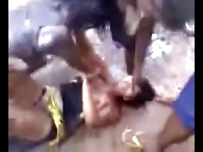Crazy Chicks Literally Fight on the Muddy Street...... A real Mud Fight, w/ a Shirt that comes Off Too
