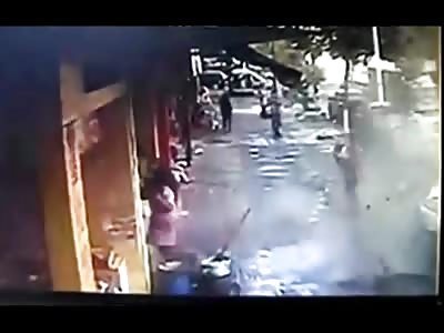 Man is Launched in the Air by a Manhole Cover in China... Almost Kills Mother Carrying Her Baby Also