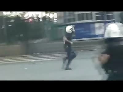 Lone Police Man Shoots Protester in the Head then Scampers off Like a Little Bitch