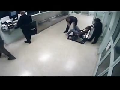 Police Restrain Woman in a Chair and Proceed to Cut her Weave Off