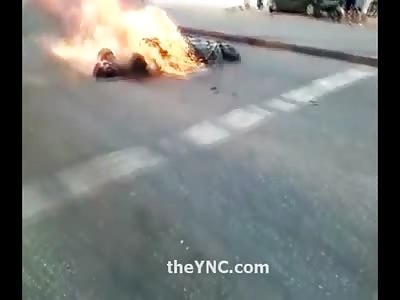 New Video of Rider Burning alongside his Motorcycle as GOOD People try to put the Fire out