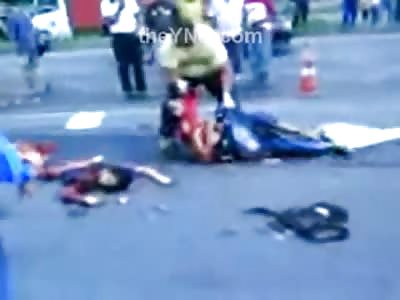 Guy Piles up the Mangled Twisted Bodies in the Middle of the Road after Car Accident