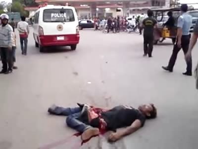 Man Twisted in Half with his Innards Spilling out on the Road