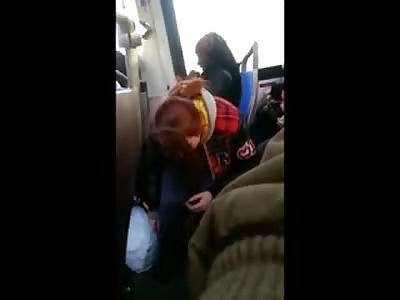 DISTURBING: Mother Nodding off After Taking Heroin hit on a Bus in Front of Her Young Daughter That's Trying to Revive Her