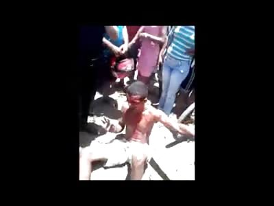 Thief Receives instant Mob Justice in the Form of a Brutal Beat Down