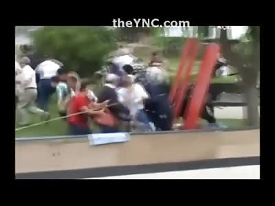 Bull jumps Fence and takes on the ENTIRE Crowd...