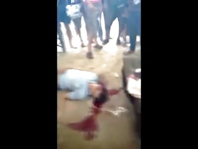 Man Agonizes on the Ground Bleeding Profusely from his Head