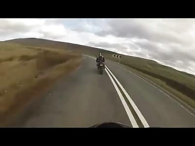 Amazing Video of Speeding Biker wearing a GO-PRO who Goes Head On into a Oncoming Car