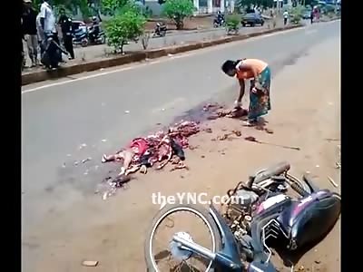 Remarkable Video of Man totally Crushed by Truck...Woman is Carrying his Leg Down the Road