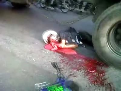Splattered, Motorcyclist Turned into Roadkill under Truck