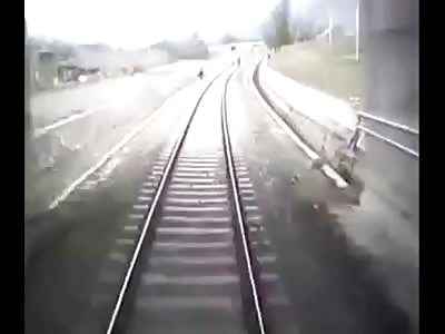 Man in Long Black Overcoat Suicide by Train caught on Cam