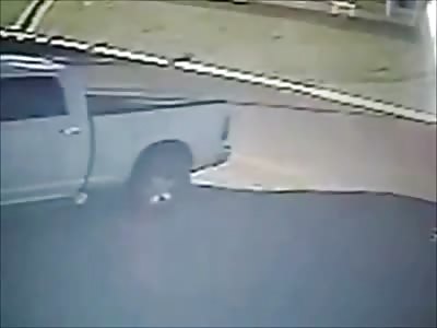 The Exact Moment a Rider Loses his Leg after Hitting a Parked White Pickup Truck