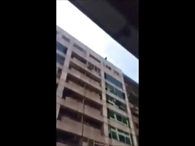 Man Swan Dives off the Top of that Building to End his Life