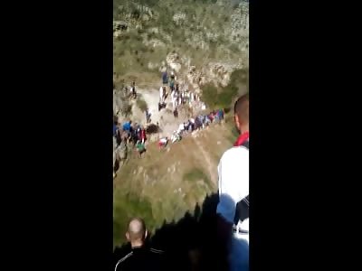 Bull Attacks People Standing on as Cliff....?