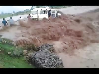 Harrowing Rescue Attempt by Good People of a Family Caught in a Life or Death Flash Flood  