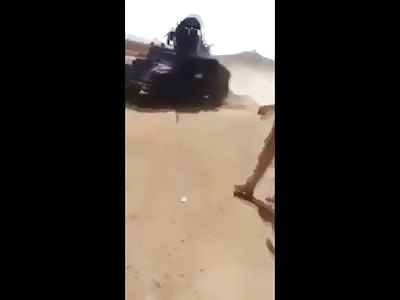 Iraqi Solider Dragging and Desecrating Body of their Enemy