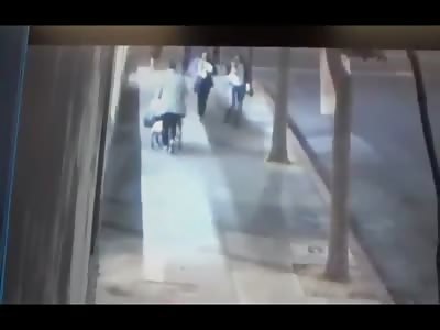 Homeless Woman Pushing a Shopping Cart Randomly Attacks 85 Year Old Woman in the Street 