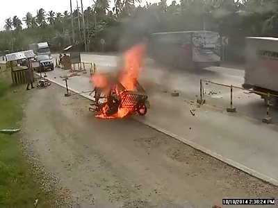 Rickshaw Style Cab is Blasted Head on and Burst into Flames Throwing the Dead Bodies of Two People