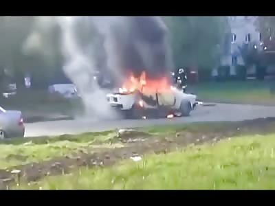 2 Firemen get Too Close to Burning Car with Gas Cylinder inside of it and Go BOOM 