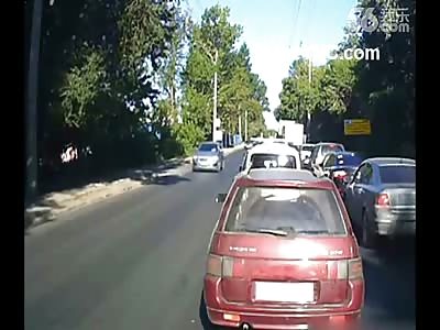 Clearly a Moron ... Kid Runs Right into Car (Possible Suicide Attempt)